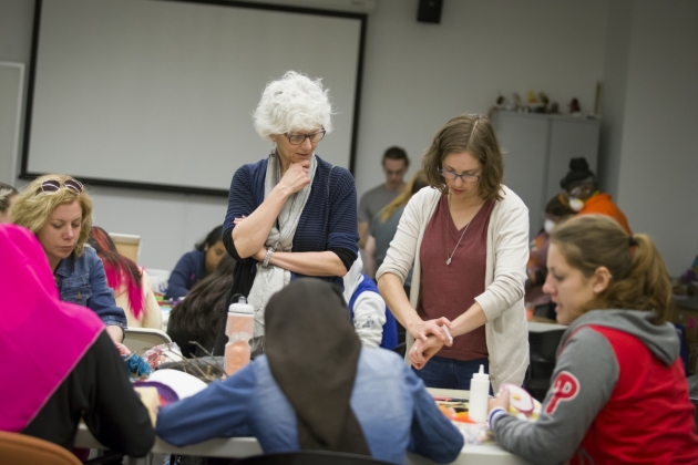 Professor Lisa Kay and students in the classroom