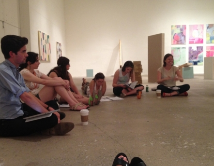 students in crit in painting studio