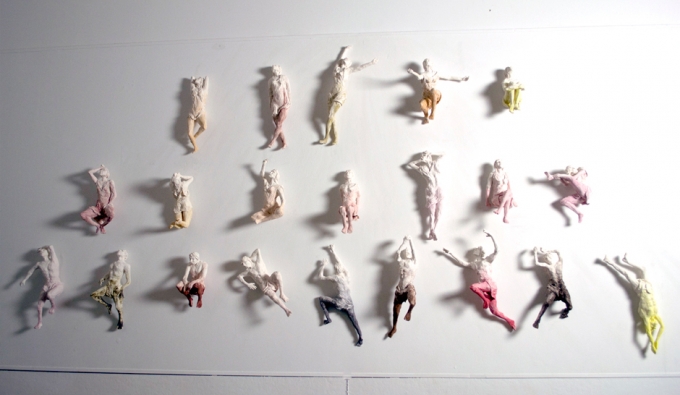 ceramics figures hung on wall