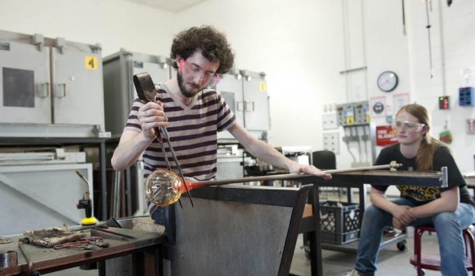 student working in glass studio