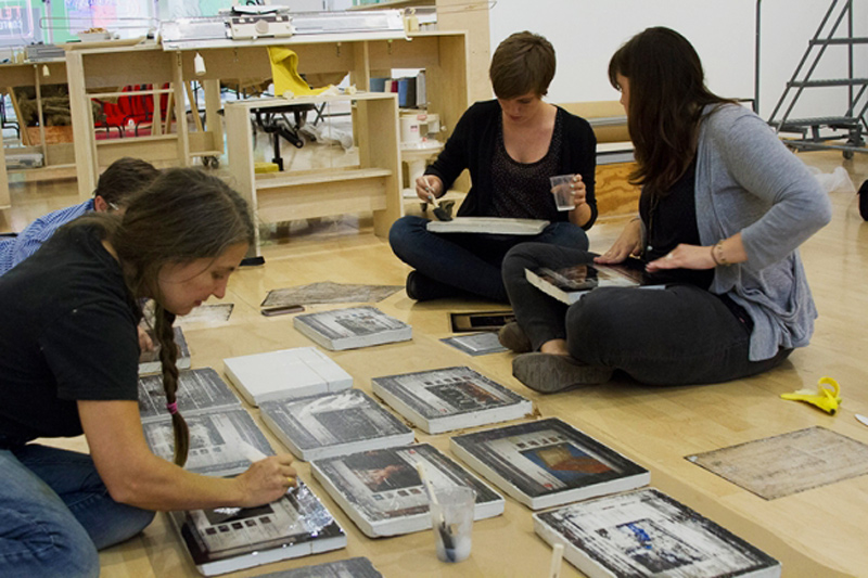 Katie Grinnan works with students during her residency