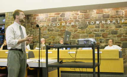 Photo of Brad Flamm presenting in Montgomery Township building