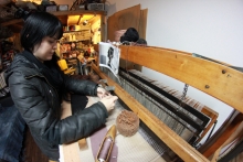 erin working at loom