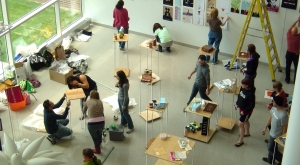 Students setting up an exhibit