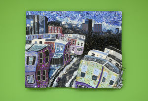 Colorful cityscape fiber arts piece by Abby McNavage against a green wall