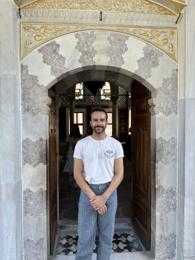 Ryan standing under an arch in Istanbul