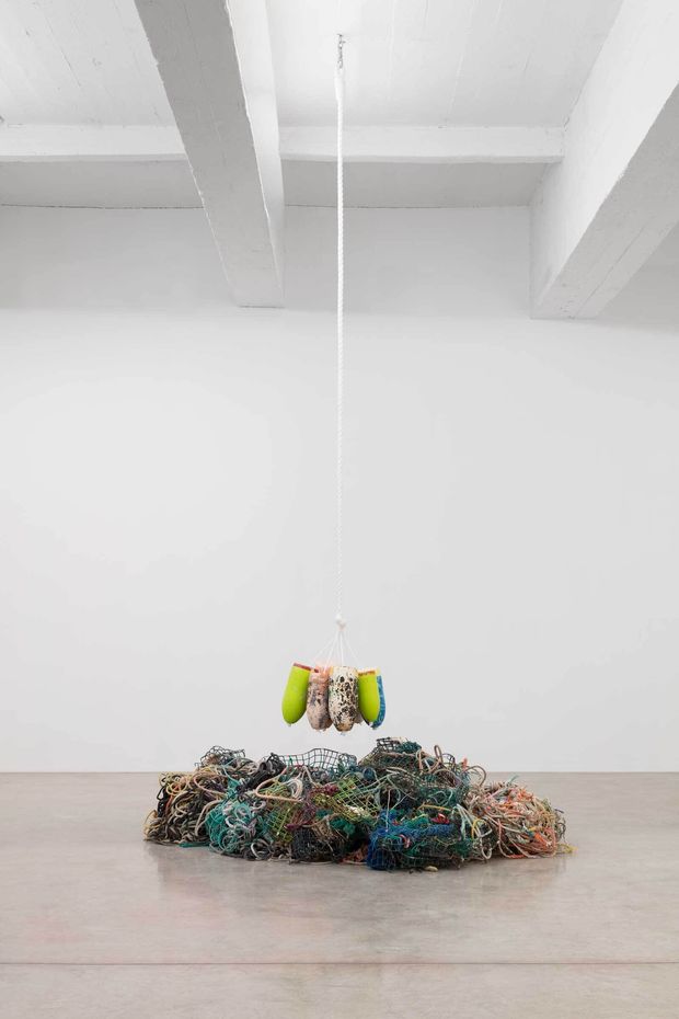 Sculpture using netting, buoys, ropes.  
