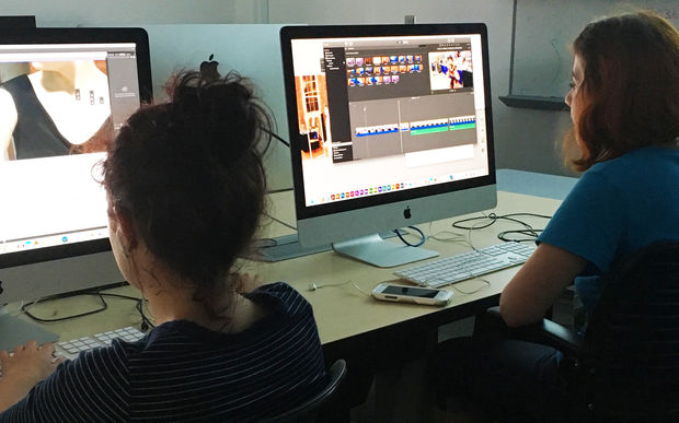 Students editing videos on the Tyler computers