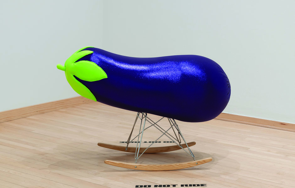 Gallery installation view of artwork by Maxwell Davis featuring a large eggplant on floor
