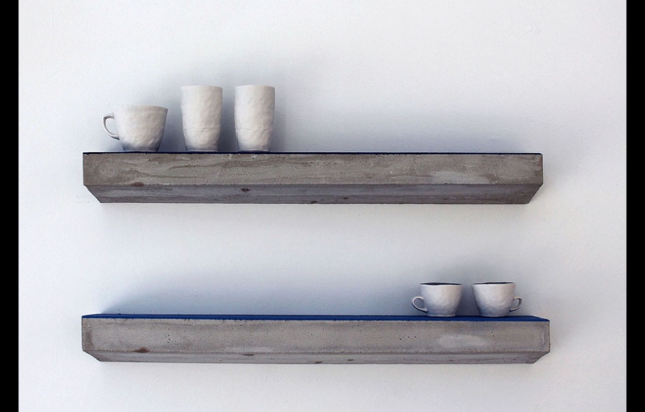 Pottery forms sitting on Two Parallel Shelves