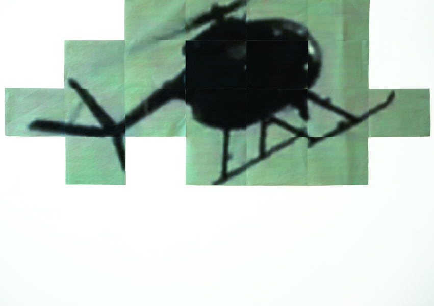 Image of a helicopter made up of many photos of parts of the helicopter