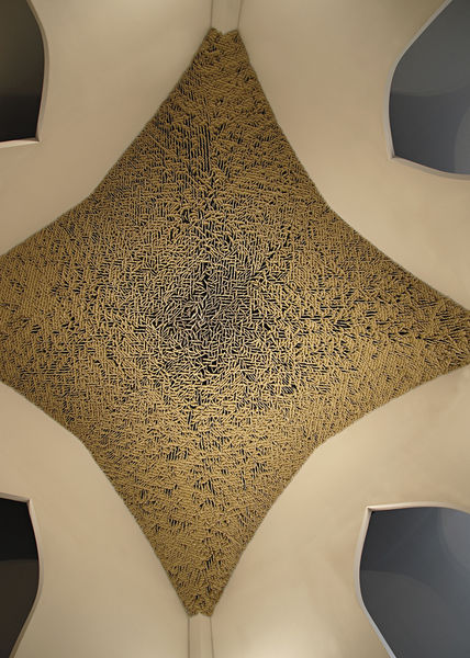Mixed media ceiling installation with car air fresheners by Sharyn O'Mara