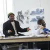 People in conversation seated in an architecture studio