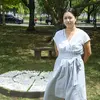 Rachel Hsu poses with her installation, The Weight of Our Living
