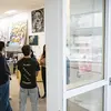 students stand in the admissions office