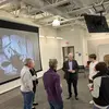 Group of people in conversation standing in a circle