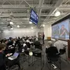 Roundtable participants seated in a semi-circle
