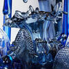 Arrangement of blue glass artworks