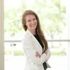 Portrait of Laura Kazmierczak smiling at the camera