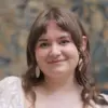 Portrait of Marie Latham smiling at the camera