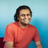Alpesh Kantilal Patel smiling at the camera.