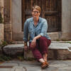 Emily Neumeier sitting outdoors on a step