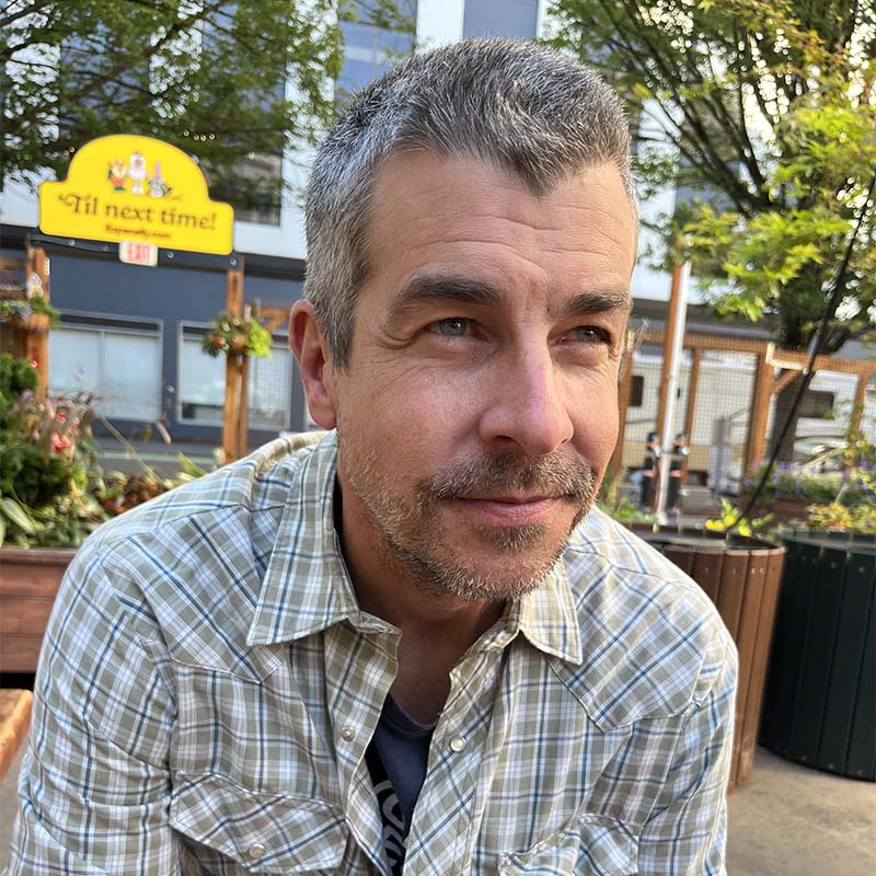 Philip Glahn looking past the camera