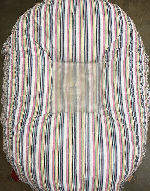 Multicolor strip fabric shaped like a cushion